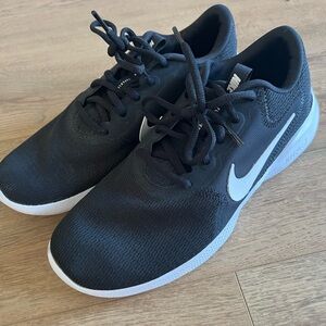 Nike Black Mesh Sneakers with White Swoosh